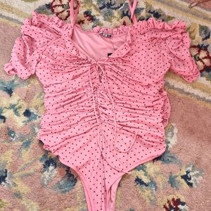 Pink polkadot bodysuit
